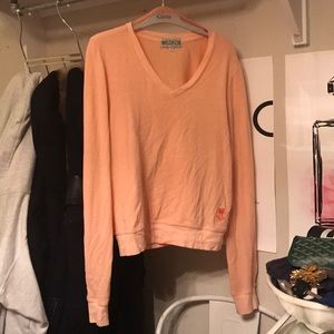 Peach colored Xs wildfox sweater